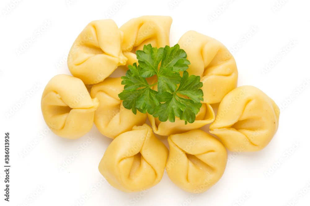 Raw homemade pasta,tortellini with herbs. Raw homemade pasta,tortellini with herbs.