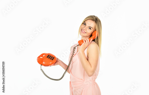 hello. modern and vintage technology. telephone conversation with friend. Cheerful woman talking on land line phone. connection and communication. pretty woman with retro phone