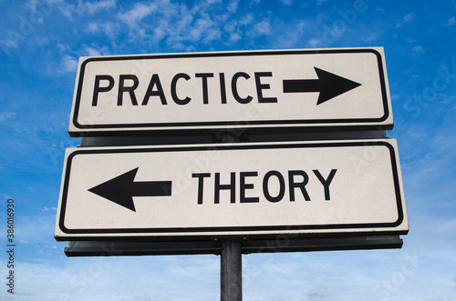 Practice vs theory. White two street signs with arrow on metal pole with word. Directional road. Crossroads Road Sign, Two Arrow. Blue sky background. Two way road sign with text.