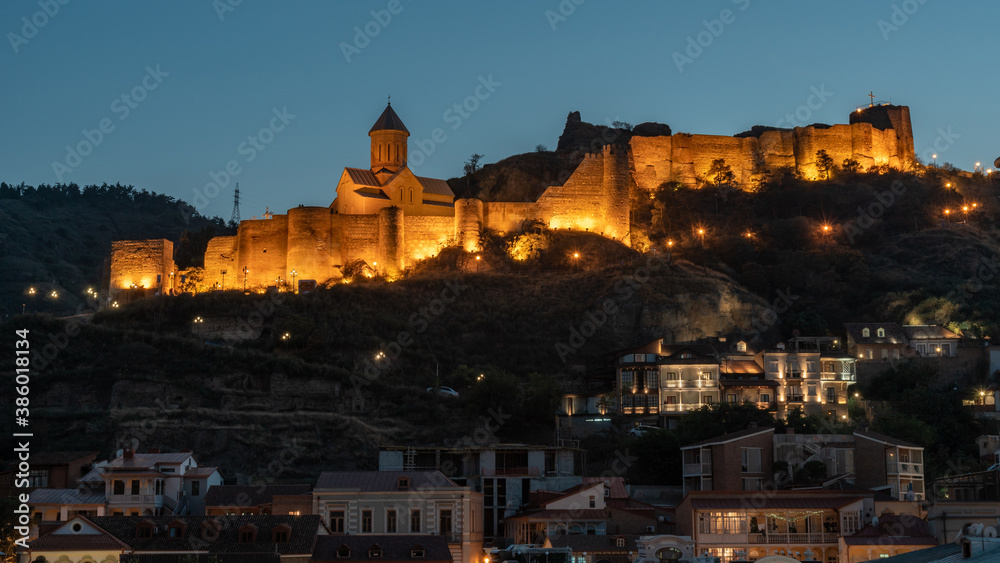 Night view of old Tbilisi. Narikala Fortress and other landmarks of the city