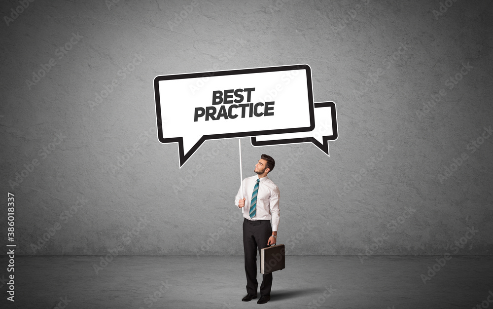 Young business person in casual holding road sign with BEST PRACTICE inscription, new business idea concept Young business person in casual holding road sign with BEST PRACTICE inscription, new business idea concept