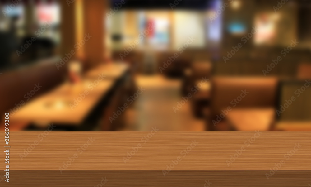 Empty table with blurred restaurant background to display your product