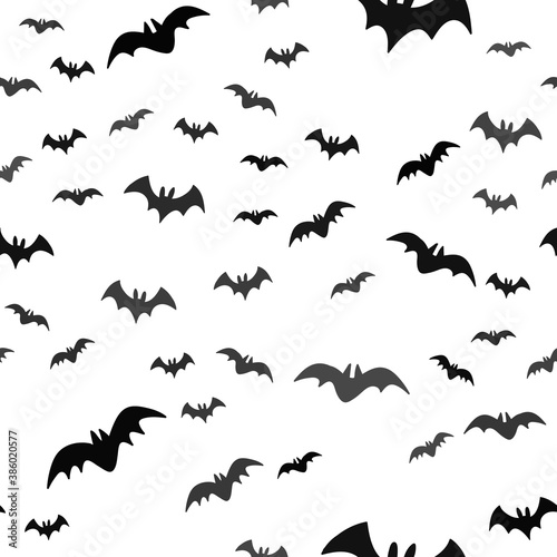 Halloween pattern with flying bats. Vector seamless background. Bat simple illustration texture. © Matias