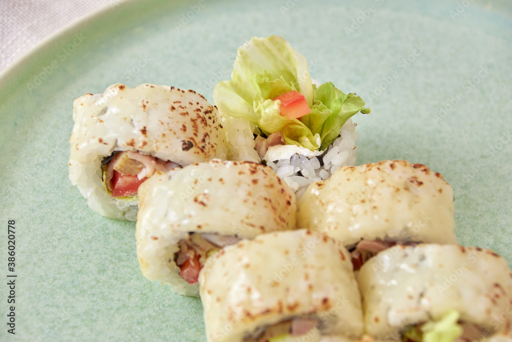 Fresh sushi rolls on a plate