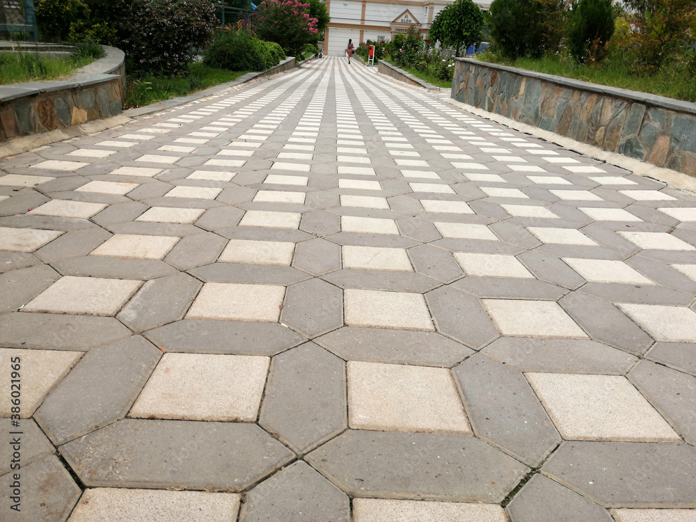 decorative stone pavement road in the park
decorative stone pavement road in the park