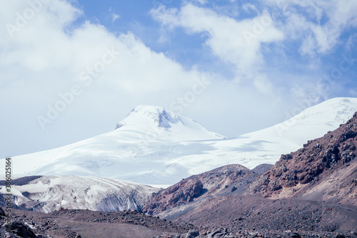 big Elbrus mountain in summe on cloudy day © yurakrasil
