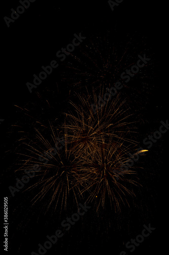 Obraz na płótnie Colored fireworks on dark background texture. Surreal 