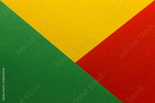 Beautiful multicolored background of yellow, green and red blank paper sheets with fine texture, close up.