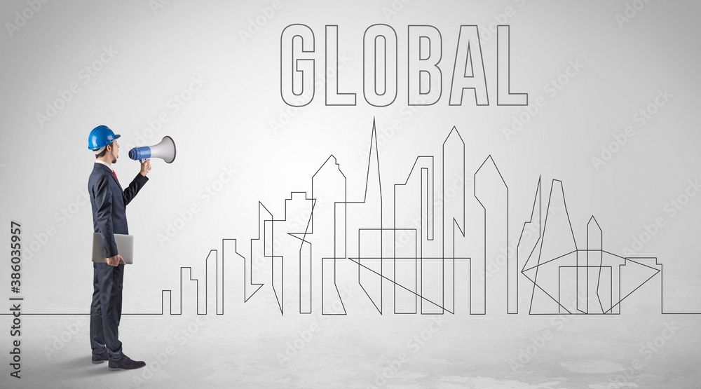 Businessman in hard hat holding blueprint with GLOBAL inscription, engineering and architecture concept Businessman in hard hat holding blueprint with GLOBAL inscription, engineering and architecture concept
