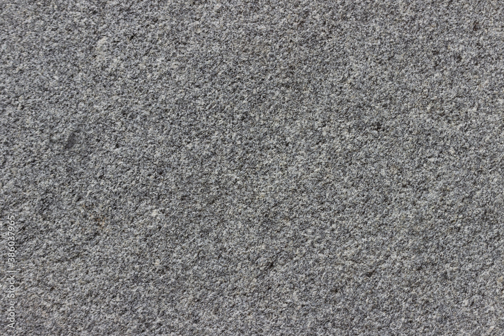 The texture of a natural stone slab from polished granite. The texture of a natural stone slab from polished granite.
