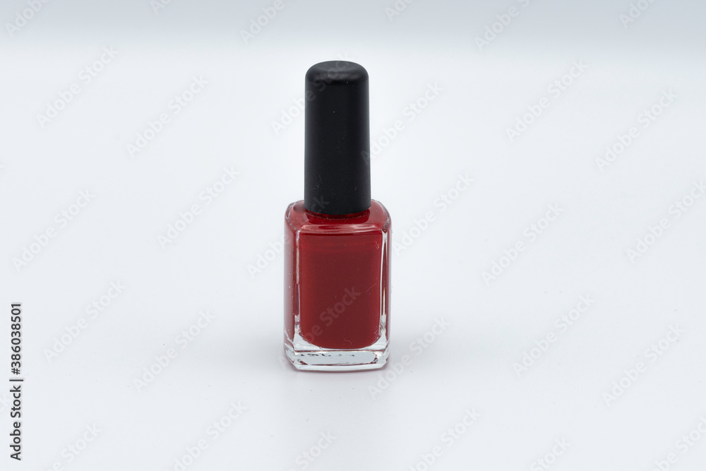 bottle of colored nail polish on white background bottle of colored nail polish on white background