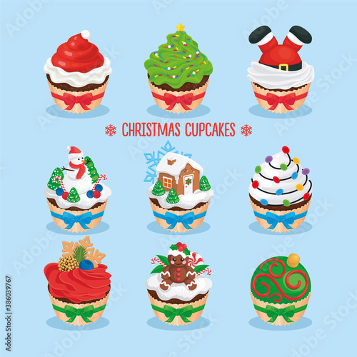 SET OF CHRISTMAS CUPCAKES, DECORATED WITH VARIOUS FIGURES, CREAM, BERRIES, MARZIPAN, CONFECTIONERY