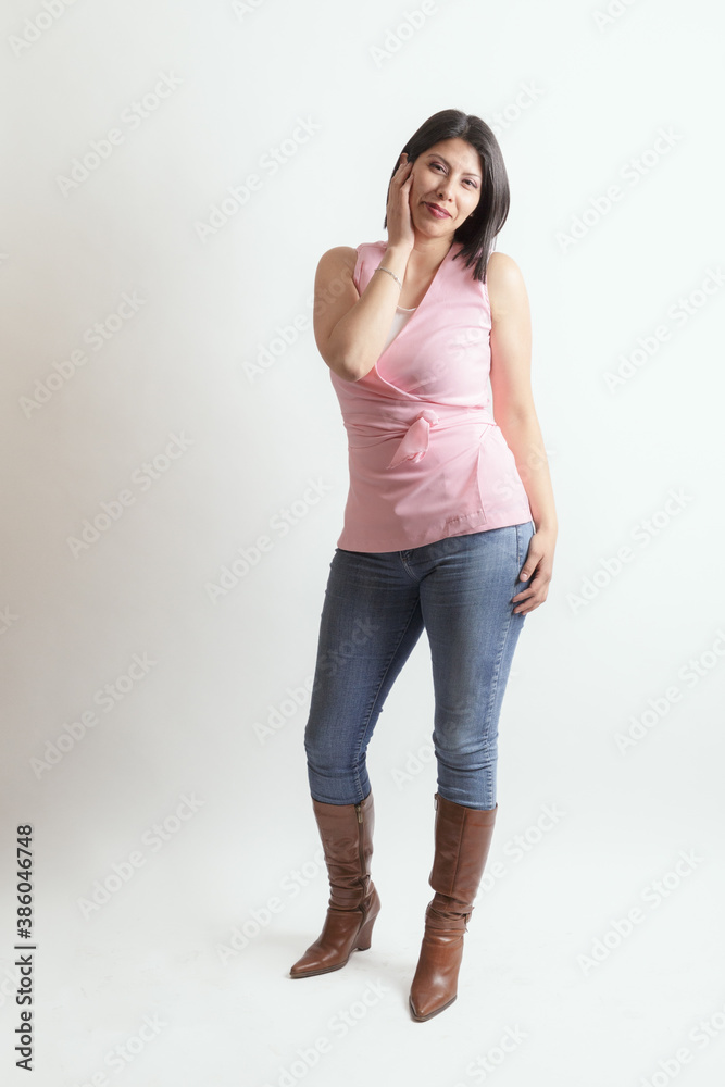 woman in studio posing with casual attire woman in studio posing with casual attire