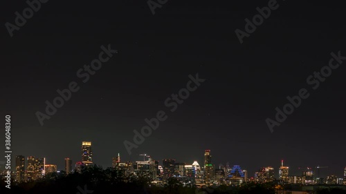 Wallpaper Mural Zooming Out of Downtown Skyline at Night with Stars and Planes moving Torontodigital.ca