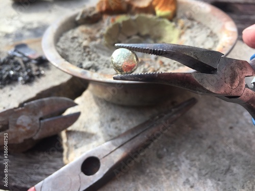 gold refining assay  Cupellation with lead and bone ash crucible  an ancient technique for purifying gold silver or other noble metal