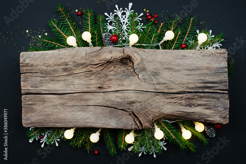 Christmas or new year background on a black table with space for text. Greeting card