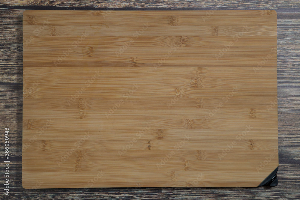 Cutting Board for cooking on a wooden background.