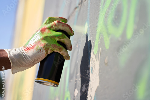 Man holding aerosol photo