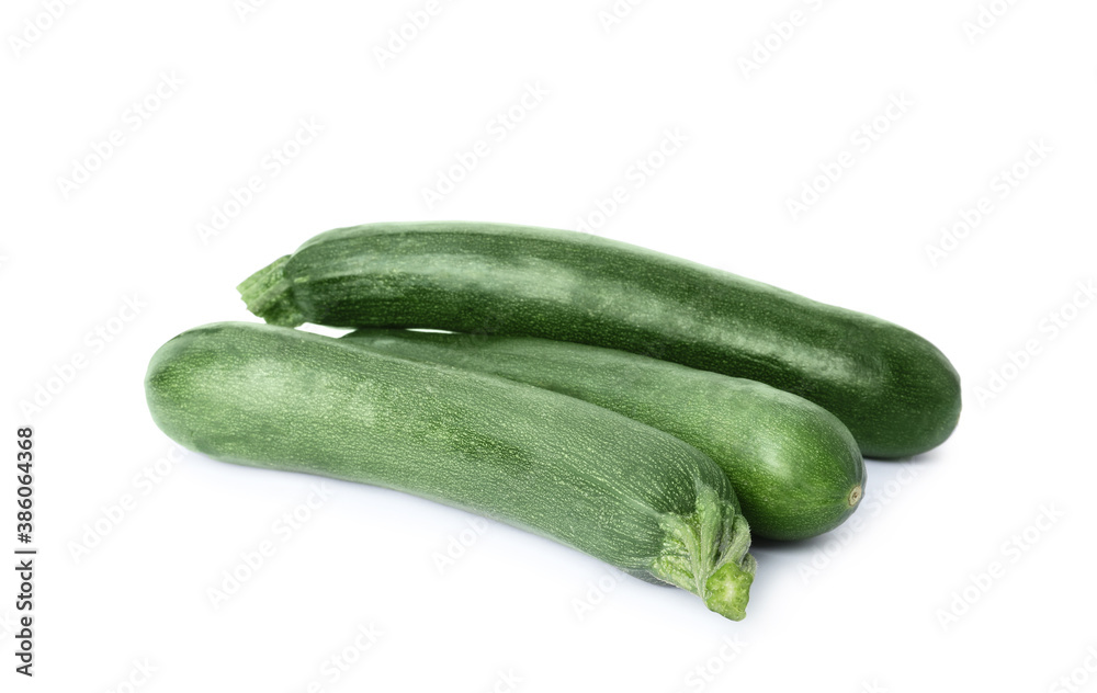 Raw green ripe zucchinis isolated on white