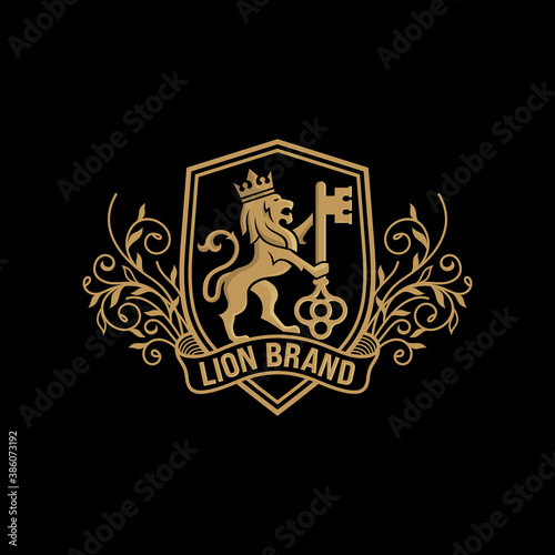 Fototapeta Naklejka Na Ścianę i Meble -  Luxury Golden Royal Lion King logo design inspiration