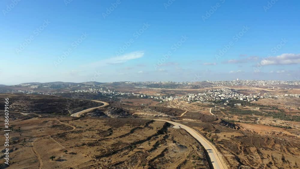 Israel Palestine border with Bir Nabala town aerial view drone
