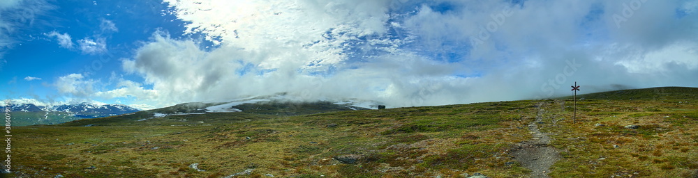 The fog on mount Nuolja is slowly lifting The fog on mount Nuolja is slowly lifting