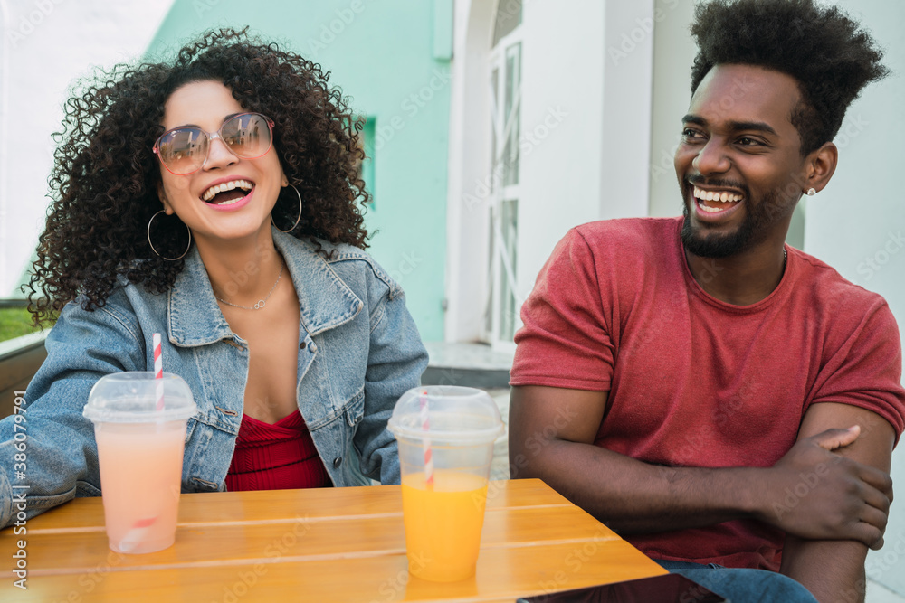 Two afro friends having fun together. Two afro friends having fun together.
