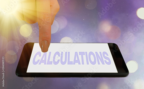 Conceptual hand writing showing Calculations. Concept meaning mathematical determination of the size or number of something Modern gadgets white screen under colorful bokeh background photo