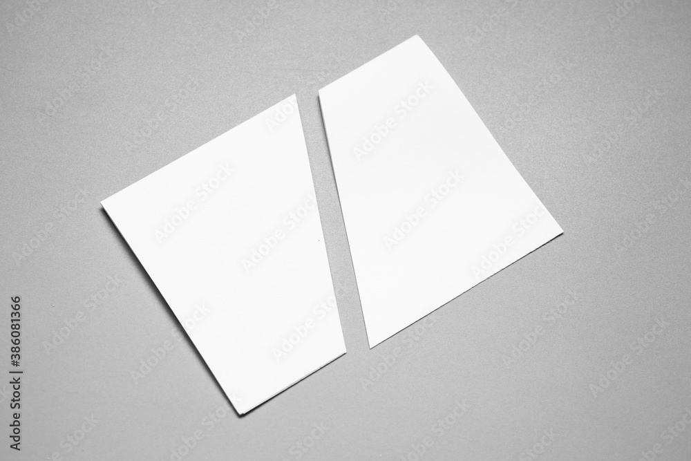 Blank portrait mock-up paper. brochure magazine isolated on gray, changeable background / white paper isolated on gray Blank portrait mock-up paper. brochure magazine isolated on gray, changeable background / white paper isolated on gray