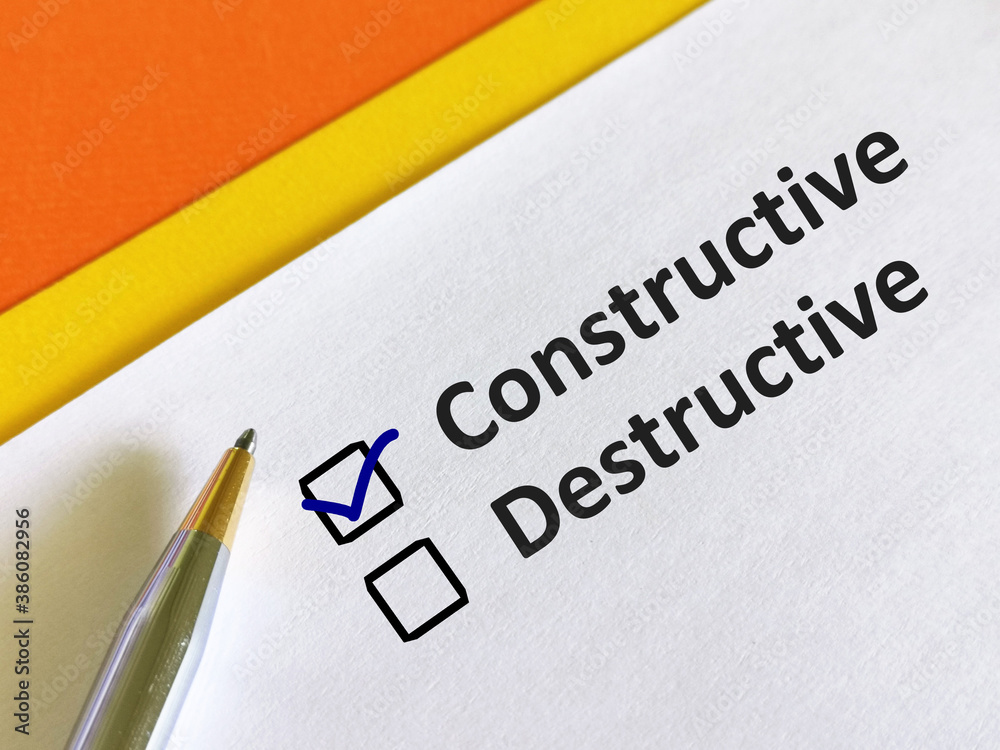 One person is answering question. He is choosing between constructive and destructive. One person is answering question. He is choosing between constructive and destructive.
