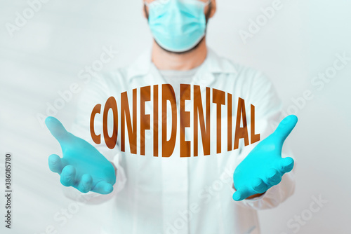 Handwriting text Confidential. Conceptual photo containing an individualal information whose unauthorized disclosure Laboratory Technician Featuring Empty Sticker Paper Accessories Smartphone photo