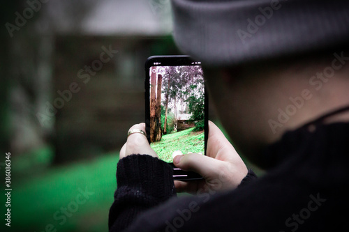 Person taking a photo of the nature