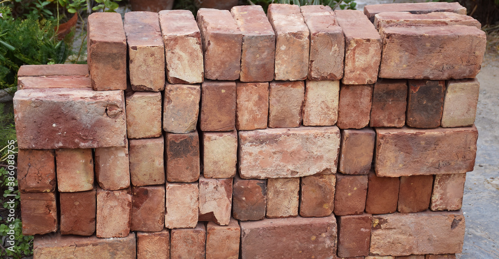 Fototapeta premium Close up of Pile of bricks at a construction site