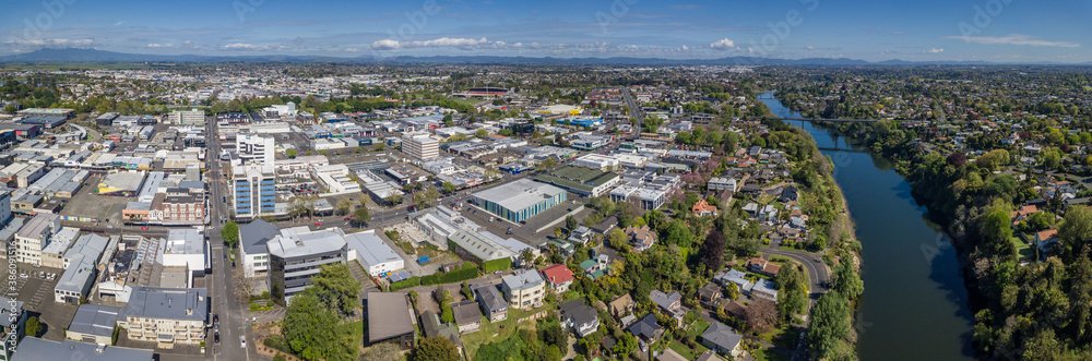 Aerial drone panoramic view over the Waikato River as it cuts through the city of Hamilton, in the Waikato region of New Zealand