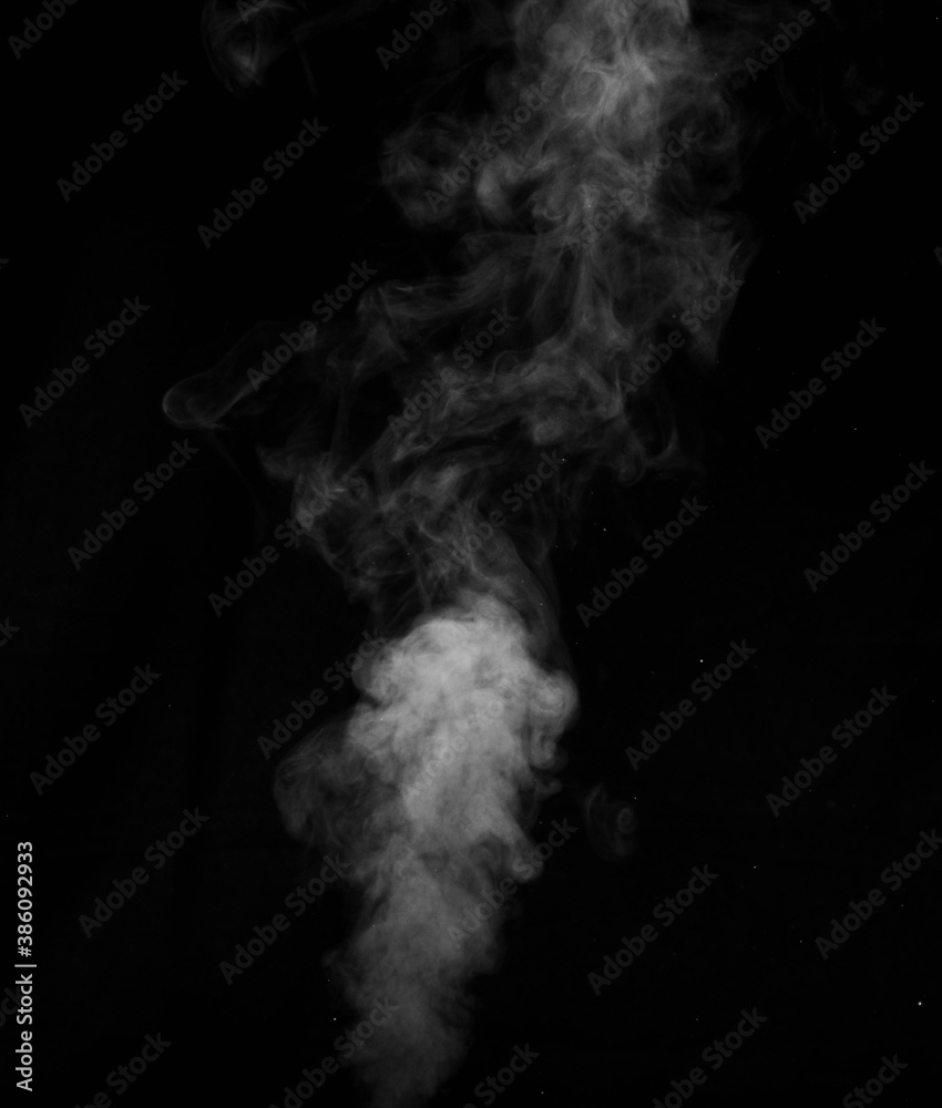 Figured smoke on a dark background. Abstract background, design element, for overlay on pictures Figured smoke on a dark background. Abstract background, design element, for overlay on pictures