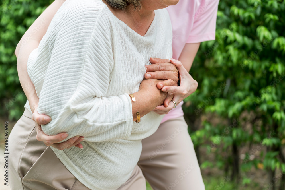Asian female woman take care and support Elder Asian senior female