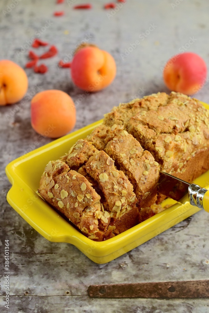 Apricot walnut goji berry oat loaf cake. Selective focus Apricot walnut goji berry oat loaf cake. Selective focus