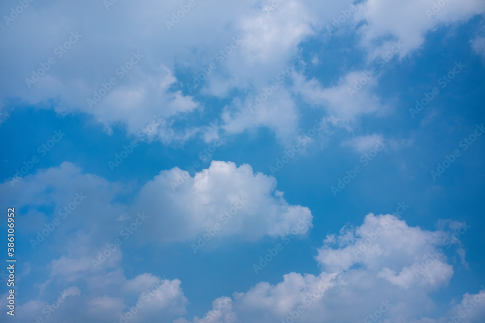 Obraz premium Soft white clouds and blue sky background.