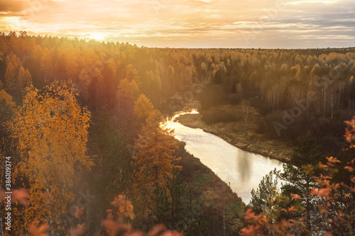 beautiful autumn landscape. river in the sunset © iloli