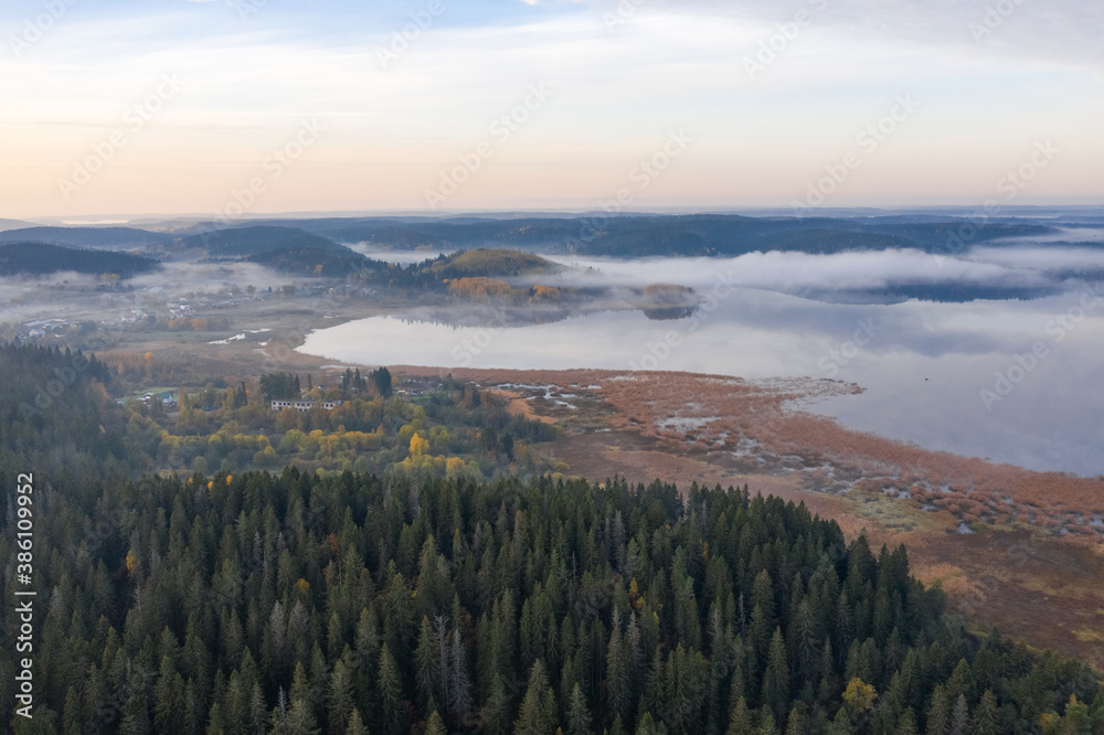 Fototapeta premium Sortavala outskirts. Karelian nature from above. Morning northern landscape, Russian north.