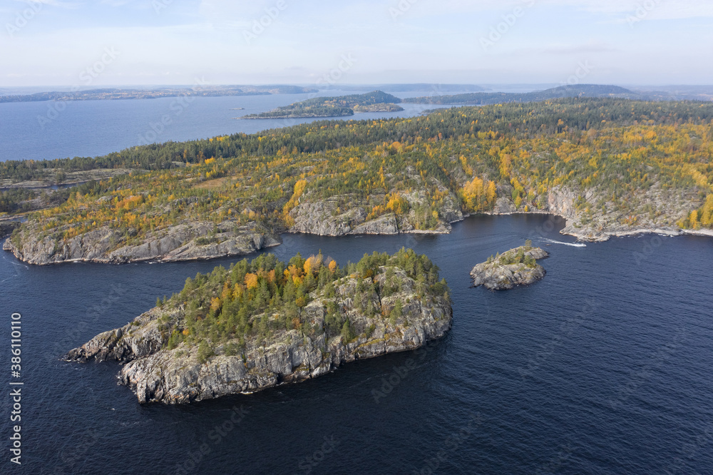 Nature of Russia. The Republic of Karelia. Islands on the horizon. Wild nature. Calm on the lake. Karelia Ladoga Lake.
