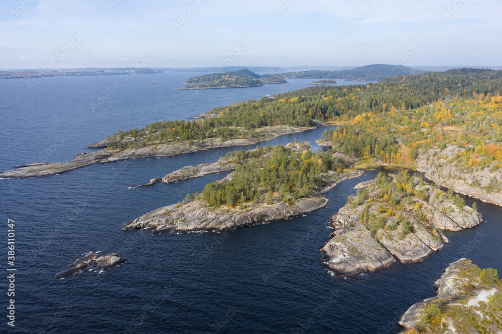 Nature of Russia. The Republic of Karelia. Islands on the horizon. Wild nature. Calm on the lake. Karelia Ladoga Lake.