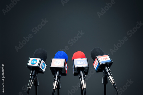 Set of microphones ready for the press conference photo