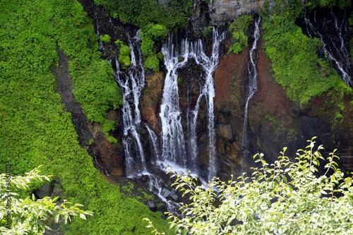 Fototapeta Naklejka Na Ścianę i Meble -  waterfall in the mountains in the forest
