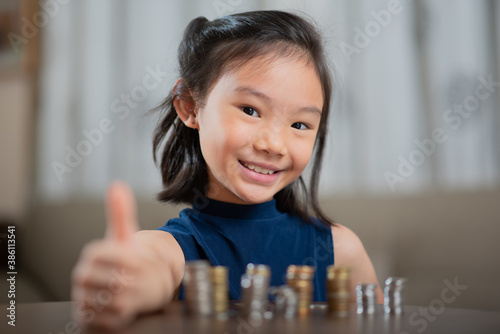 Asian children, managing finances, counting money 