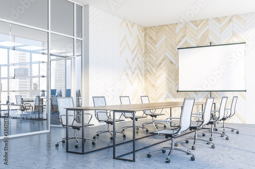 White and wooden meeting room corner with screen photo