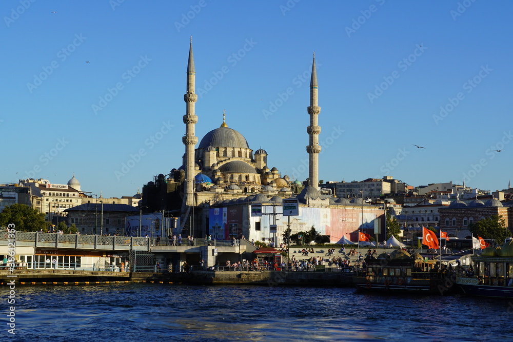 Obraz premium Istanbul, Turkey - August, 2020: Stunning Panoramic view of Ortakoy Istanbul landscape beautiful sunrise with clouds Ortakoy Mosque and Bosphorus Bridge. Best touristic destination of Istanbul. The
