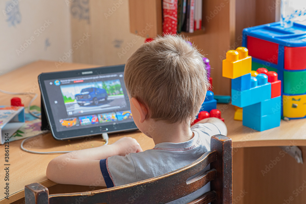A first grader performs a school task on Road Safety Remotely, in connection with the Covid-19 pandemic A first grader performs a school task on Road Safety Remotely, in connection with the Covid-19 pandemic