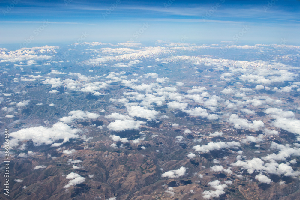 Fototapeta premium areal view of clouds and desert