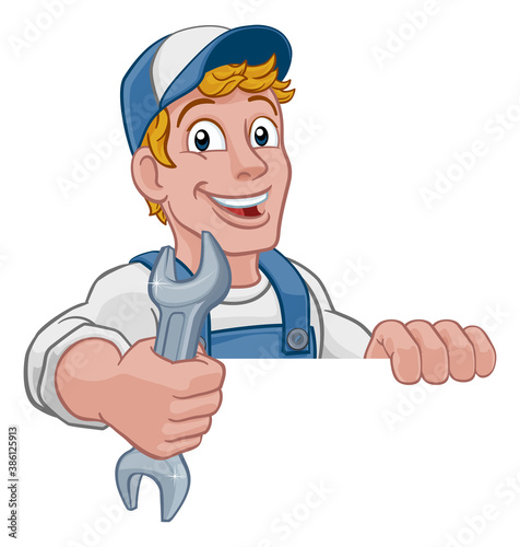 Mechanic plumber maintenance handyman cartoon mascot man holding a wrench or spanner. Peeking over a sign